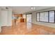 Open living area flows into the kitchen with stainless steel appliances at 6086 Shadow Oak Dr, North Las Vegas, NV 89031