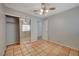 Well-lit bedroom with mirrored closet and ceiling fan at 6425 Mountain Mesa Ave, Las Vegas, NV 89156