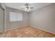 Cozy bedroom with tile floors and ceiling fan at 6425 Mountain Mesa Ave, Las Vegas, NV 89156