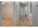 Bright hallway with tile flooring, leading to bedrooms and bath at 6425 Mountain Mesa Ave, Las Vegas, NV 89156