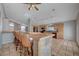 Kitchen boasts a breakfast bar with seating and tile flooring at 6425 Mountain Mesa Ave, Las Vegas, NV 89156