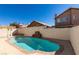 Spacious pool area with a tranquil waterfall feature at 6425 Mountain Mesa Ave, Las Vegas, NV 89156