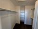 This walk-in closet features shelving and hanging space, providing ample storage at 6448 Elwood Mead Ave # 103, Las Vegas, NV 89156