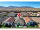 Scenic aerial view of a home with desert landscaping, patio, and proximity to the mountains at 6544 Sandero Springs St, Las Vegas, NV 89166