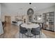 Open-concept dining area with access to kitchen and outdoor patio, creating an airy atmosphere at 6544 Sandero Springs St, Las Vegas, NV 89166