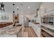 Modern kitchen featuring stainless steel appliances, granite countertops, and white cabinetry at 6544 Sandero Springs St, Las Vegas, NV 89166