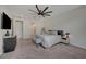 This is a modern main bedroom featuring a ceiling fan, and neutral decor at 6544 Sandero Springs St, Las Vegas, NV 89166