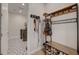 Mud room with a bench, coat rack, and patterned tile floors at 6544 Sandero Springs St, Las Vegas, NV 89166