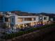 Stunning modern home featuring a sleek design and inviting outdoor space with a pool and mountain views at 709 Dragon Peak Dr, Henderson, NV 89012