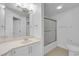 Clean bathroom with vanity, ample storage, and shower-tub combination at 7135 S Durango Dr # 209, Las Vegas, NV 89113