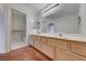 Bathroom with double sinks and a separate shower at 7232 Vista Bonita Dr, Las Vegas, NV 89149