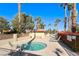 Community hot tub with lounge chairs nearby at 7232 Vista Bonita Dr, Las Vegas, NV 89149