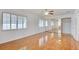 Bright bedroom featuring hardwood floors and mirrored closet at 7337 Tealwood St, Las Vegas, NV 89131