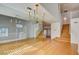 Elegant dining room with hardwood floors and a chandelier at 7337 Tealwood St, Las Vegas, NV 89131