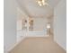 Spacious loft area with neutral carpeting and open railing at 7337 Tealwood St, Las Vegas, NV 89131