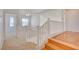 Upstairs hallway with carpet and wood flooring at 7337 Tealwood St, Las Vegas, NV 89131