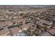 Aerial view of neighborhood with various houses and pools at 7435 Sun Summit Ct, Las Vegas, NV 89178