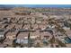 Aerial view of homes with desert landscape and mountain views at 7435 Sun Summit Ct, Las Vegas, NV 89178