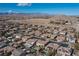 Aerial view of a neighborhood with houses and desert landscape at 7435 Sun Summit Ct, Las Vegas, NV 89178