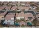 Aerial view of a luxury community showcasing upscale homes and pools at 7435 Sun Summit Ct, Las Vegas, NV 89178