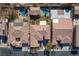 Bird's-eye view of homes with pools and yards at 7435 Sun Summit Ct, Las Vegas, NV 89178