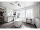 Elegant bathroom featuring a freestanding bathtub and modern fixtures at 7435 Sun Summit Ct, Las Vegas, NV 89178