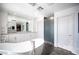 Bright bathroom with a large soaking tub and double sinks at 7435 Sun Summit Ct, Las Vegas, NV 89178