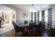 Elegant dining room features a large table and hardwood floors at 7435 Sun Summit Ct, Las Vegas, NV 89178