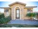 House exterior with stone accents and landscaping at 7435 Sun Summit Ct, Las Vegas, NV 89178