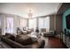 Relaxing living room with comfortable seating and a view to the kitchen at 7435 Sun Summit Ct, Las Vegas, NV 89178