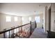 Upstairs hallway with a view of the living room below at 7435 Sun Summit Ct, Las Vegas, NV 89178