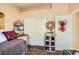 Spacious bedroom with double doors and a decorative wreath at 7666 Rainbow Cove Dr, Las Vegas, NV 89131