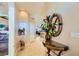 Elegant entryway with tile floors and a large mirror at 7666 Rainbow Cove Dr, Las Vegas, NV 89131