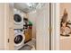 Convenient laundry room with stackable washer and dryer at 7666 Rainbow Cove Dr, Las Vegas, NV 89131