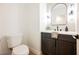 Half bathroom with modern vanity and fixtures at 7695 Silver Wells Rd, Las Vegas, NV 89149