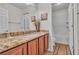 Bathroom with a granite countertop vanity and tiled floors at 790 Tossa De Mar Ave, Henderson, NV 89002