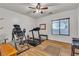 Bright exercise room with natural light and a ceiling fan, ready for your workout equipment at 790 Tossa De Mar Ave, Henderson, NV 89002