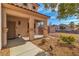 Inviting front porch with sitting bench and gravel landscaping at 790 Tossa De Mar Ave, Henderson, NV 89002