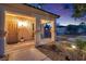 Inviting front porch with decorative lighting, stone accents, and a charming entrance at 790 Tossa De Mar Ave, Henderson, NV 89002