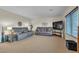 Spacious living room featuring comfortable seating and a neutral color palette at 790 Tossa De Mar Ave, Henderson, NV 89002