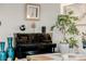 Close-up of an upright piano with decorative vases and a golden saxophone artwork at 864 Firestone Ledge Ave, Henderson, NV 89012