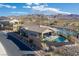 Charming single-story home with a pool and lovely views of the golf course and mountains at 91 Alta Cascata Pl, Henderson, NV 89011