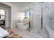 Beautiful bathroom featuring a soaking tub, walk-in shower, and marble finishes at 91 Alta Cascata Pl, Henderson, NV 89011