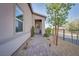 Charming front entrance with a paved walkway, complemented by manicured landscaping at 91 Alta Cascata Pl, Henderson, NV 89011