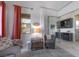 Living Room with comfortable gray seating, side table, and decorative Las Vegas sign at 91 Alta Cascata Pl, Henderson, NV 89011