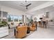 Open concept living room with modern decor and a view to the dining area and kitchen at 91 Alta Cascata Pl, Henderson, NV 89011