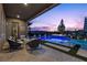 Relaxing patio with a view of the pool, providing a perfect spot for outdoor seating and entertainment at 91 Alta Cascata Pl, Henderson, NV 89011