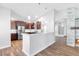 Modern kitchen with stainless steel appliances and hardwood floors at 9101 Dolphin Cove Ct, Las Vegas, NV 89117