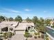 Beautiful single-story home featuring mature landscaping, a brick driveway, and a well-manicured lawn at 9300 Villa Ridge Dr, Las Vegas, NV 89134