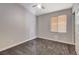 A bright bedroom with a window providing natural light and plush carpeting for comfort at 9995 Yellow Canary Ave, Las Vegas, NV 89117